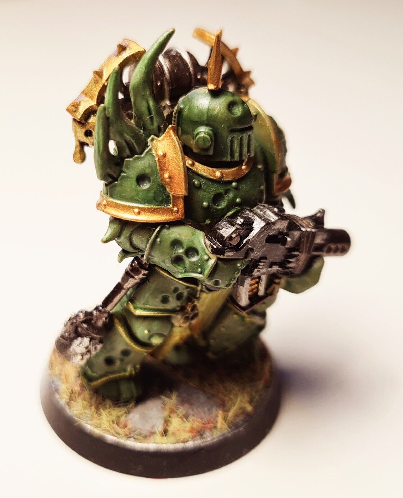 A painted Warhammer 40k figurine.